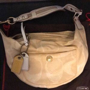 Beige and Gold Coach Handbag